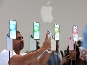 The new iPhone 15 is displayed during an Apple event.