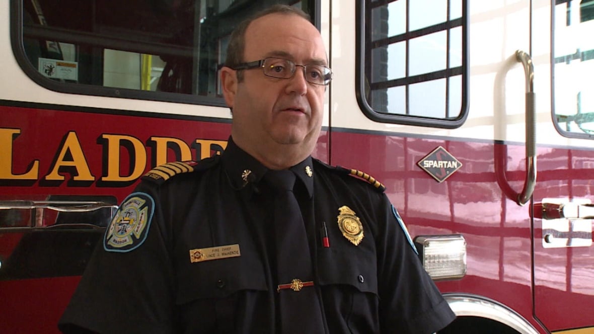 A man in the uniform of a firefighter.